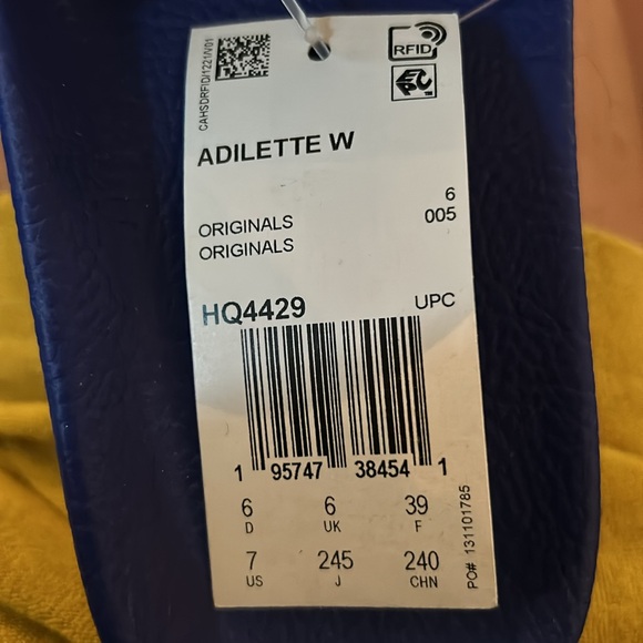 New with tags Adidas Adilette blue and black slides. Size 7 USA women’s - Picture 8 of 8